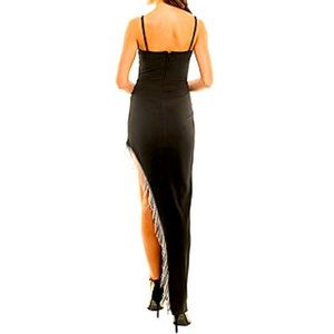 black spaghetti strap dress with a split containing rhinestones